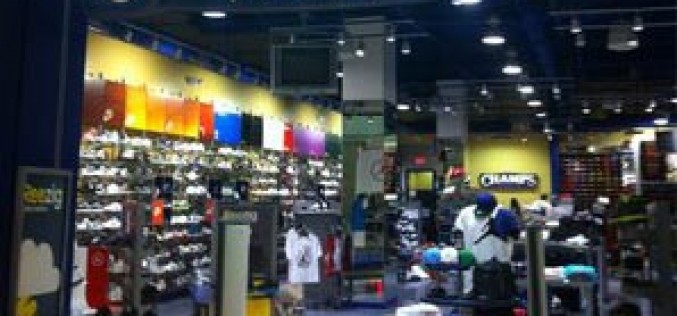 Employee practically gives away shoes to Champs Sports shoppers