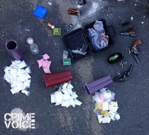 Police photo of seized drugs and guns