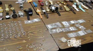 Police display some of the stolen items found in Verdin's house