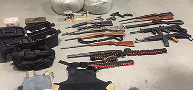 One in Custody for Mass Cache of Drugs and Weapons