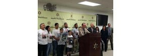 Police press conference with family members