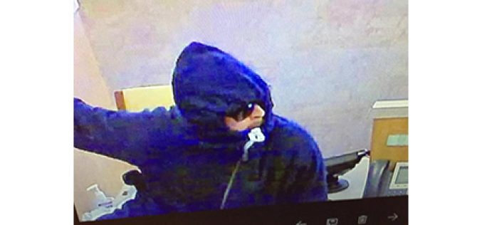 Two suspects sought in bank robbery