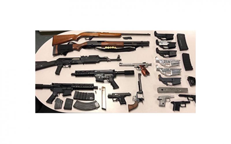 Weapons Seized during SWAT Team Raid near Police Station