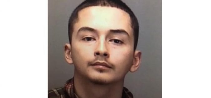 Officers spot Los Banos man spraying gang graffiti on wall