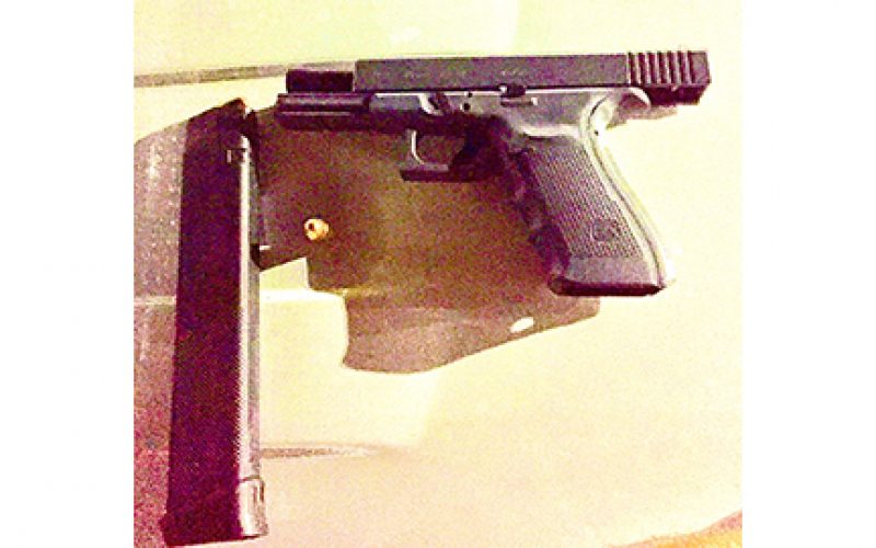 Police officers arrest gang members in possession of firearm and drugs