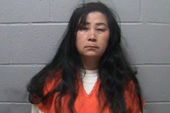 Woman arrested in shooting death of husband