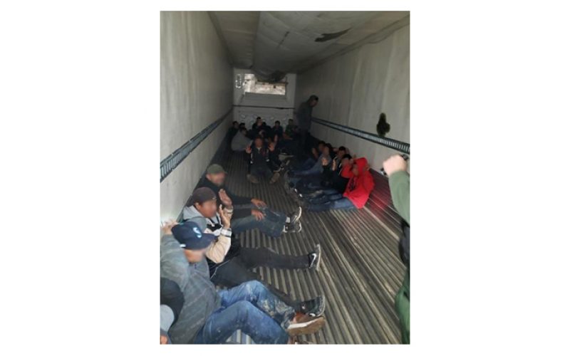 Tractor trailer driver tries to smuggle 26 illegals across the border