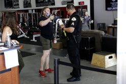 Owner reopens gym, charged with misdemeanor