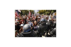 ‘Freedom’ protest against coronavirus orders leads to arrests at California Capitol