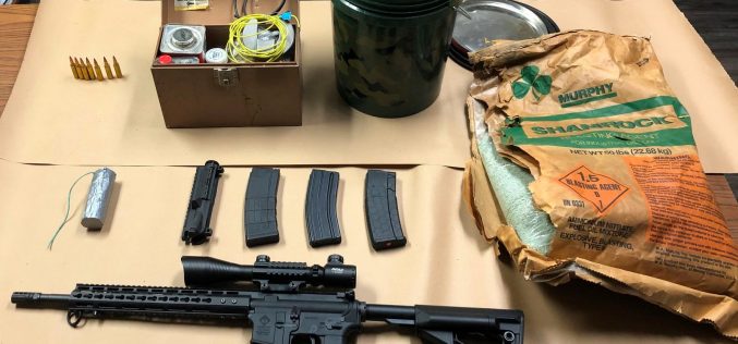 Man with active warrants arrested, gun and explosive materials seized