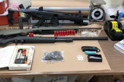 Man with felony warrant reportedly caught with weapons, drugs in car