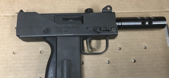 Man on felony probation caught with allegedly stolen handgun