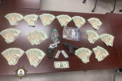 Suspicious vehicle alert leads to discovery of heroin, meth, guns