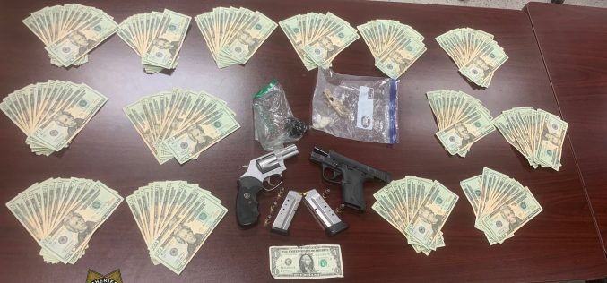 Suspicious vehicle alert leads to discovery of heroin, meth, guns