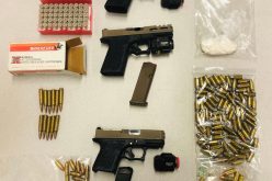 Three guns, ammo and cocaine all seized in traffic stop