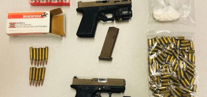 Three guns, ammo and cocaine all seized in traffic stop