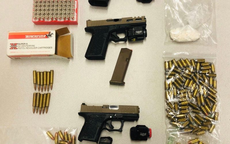 Three guns, ammo and cocaine all seized in traffic stop