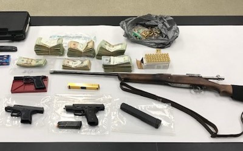 SEARCH WARRANT LEADS TO ARRESTS AND CONFISCATION OF PROHIBITED FIREARMS