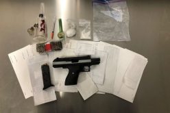 Counterfeit Checks, A Loaded Gun, and Drugs – Two Nabbed at Motel 6