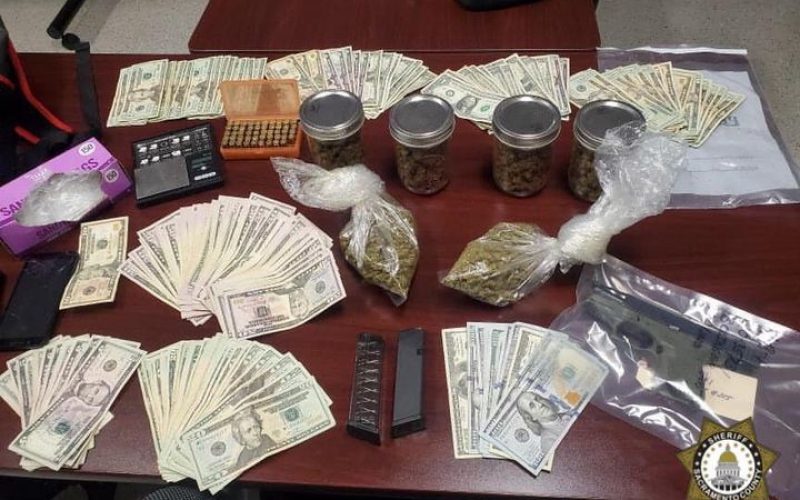 Man flees vehicle stop with gun, drugs, cash