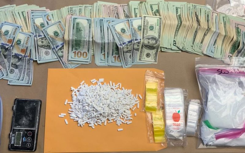 Search warrant yields cash and drug cache, no arrest