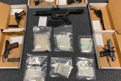 Probation check yields guns and drugs