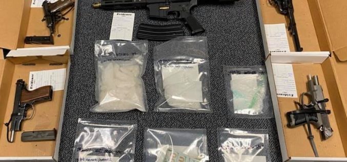 Probation check yields guns and drugs