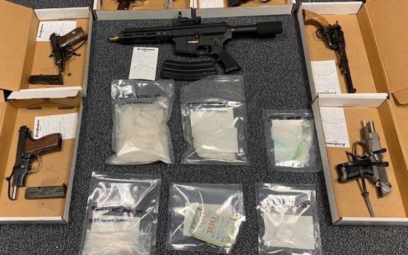 Probation check yields guns and drugs