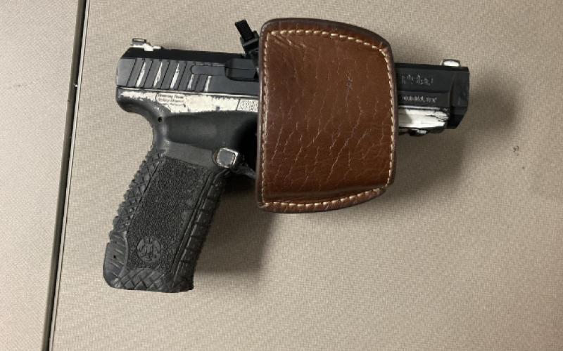 Traffic violation leads to the arrest of a parolee at large with a gun