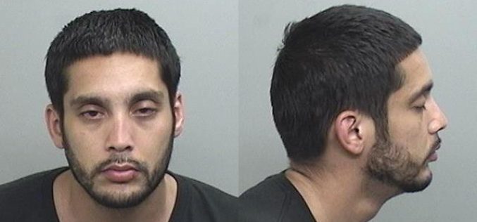 Man with warrant, drugs, fraudulent checks, pipe