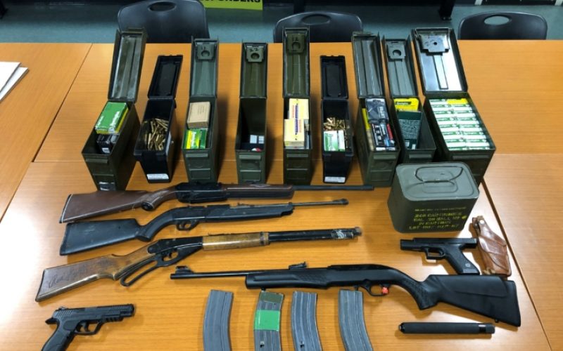 Driver Passed Out Inside a Car with Weapons and Ammunition is Arrested