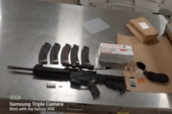 Driving with a warrant, a gun, ammo and large capacity magazines