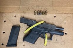 Man arrested after authorities reportedly find loaded, unregistered gun in vehicle