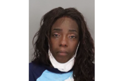 Police Arrest Woman for Alleged Assault with Wine Bottle