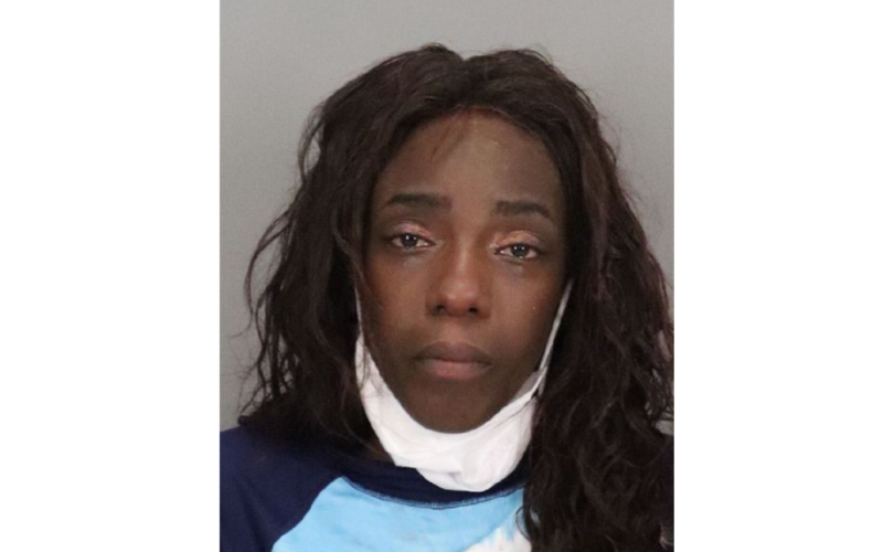 Police Arrest Woman for Alleged Assault with Wine Bottle