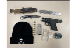 Probationer Caught with Guns and Drugs